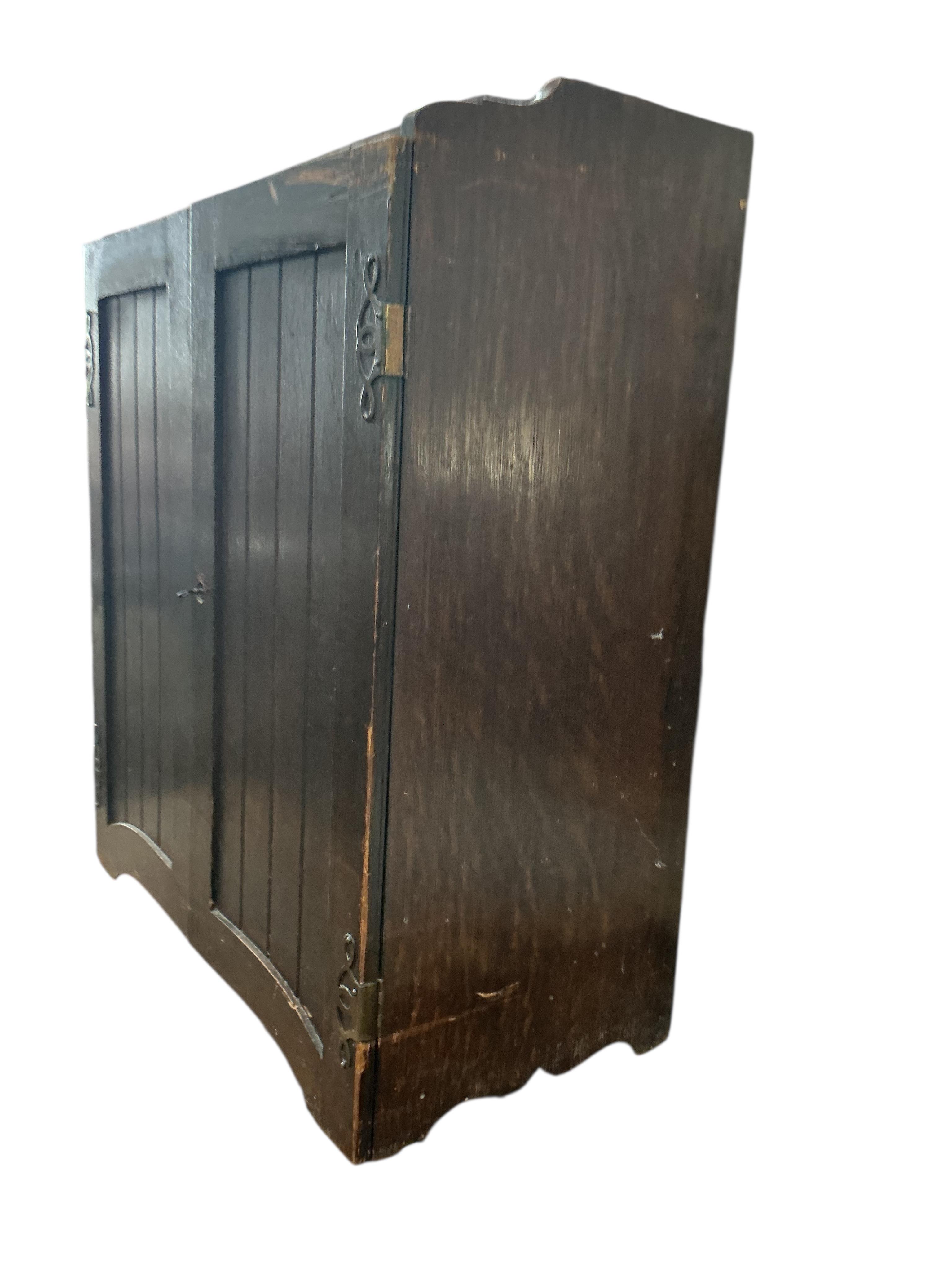 An Edwardian oak stationery cabinet, width 57cm, depth 29cm, height 72cm